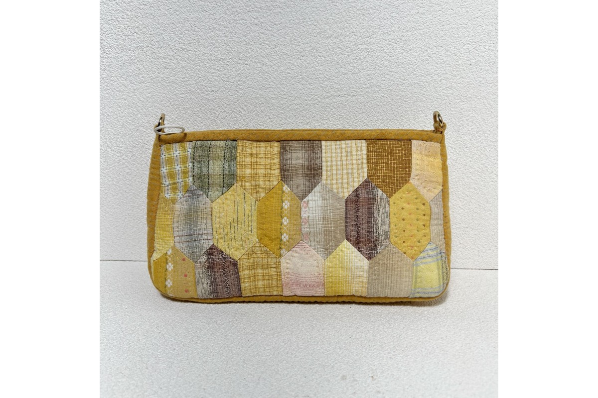 Earth-tone geometric crossbody bag