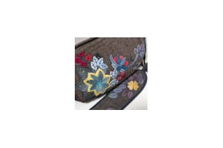 Vintage applique crossbody bag with adjustable shoulder strap