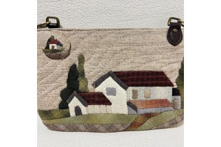 Double zippered wallet with house applique