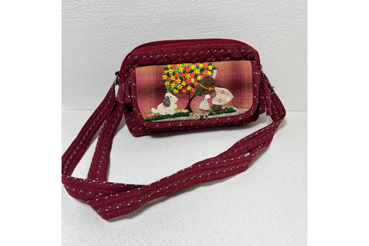 Burgundy fabric multi-pocket crossbody bag