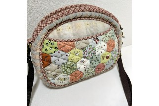 Adjustable shoulder bag with house applique